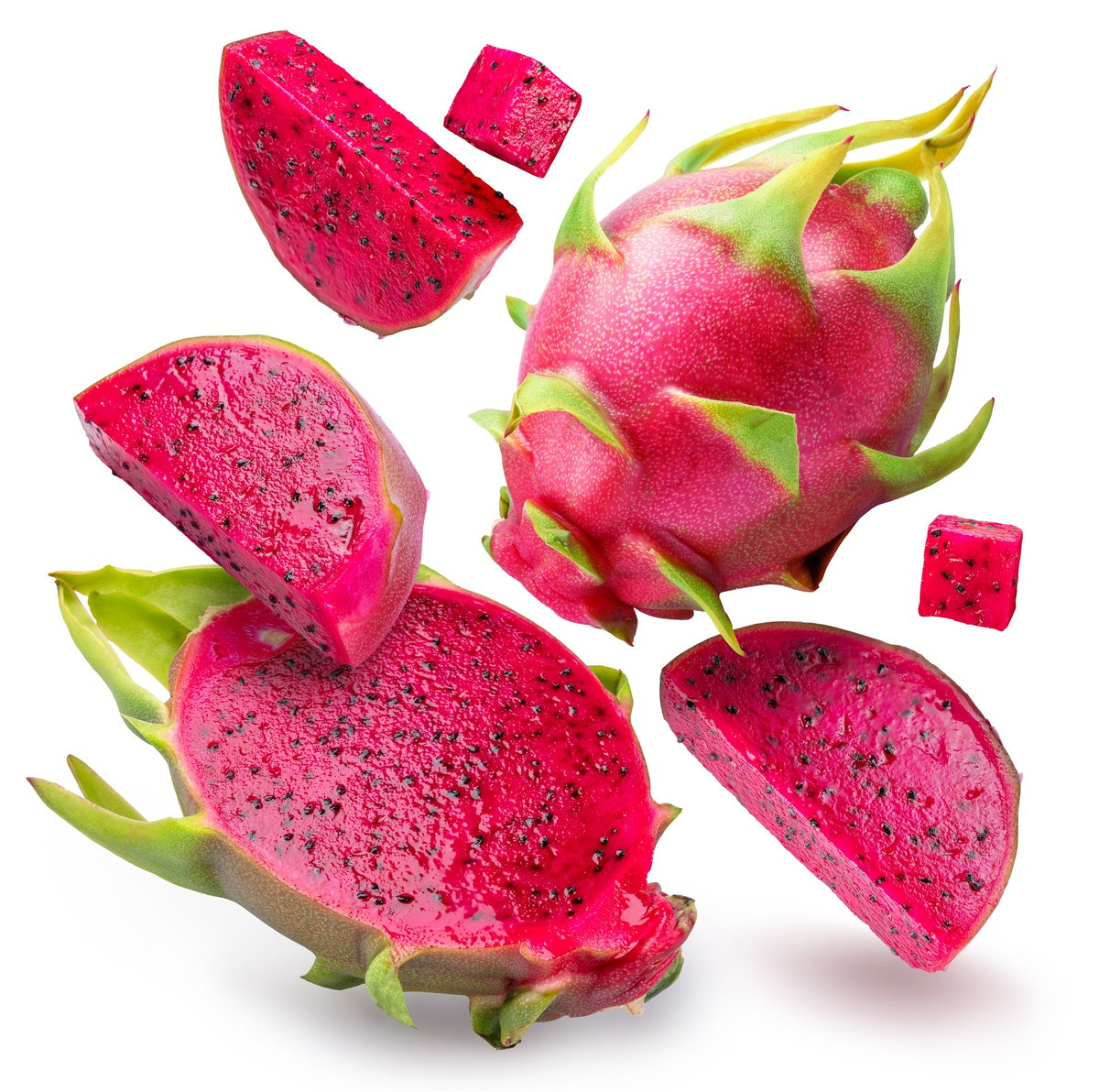 Red pitahayas or red dragon fruits and fruit slices levitating on air on white background
